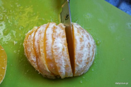 Επιδόρπιο πορτοκαλιού με ζελέ και καβουρδισμένα αμύγδαλα.